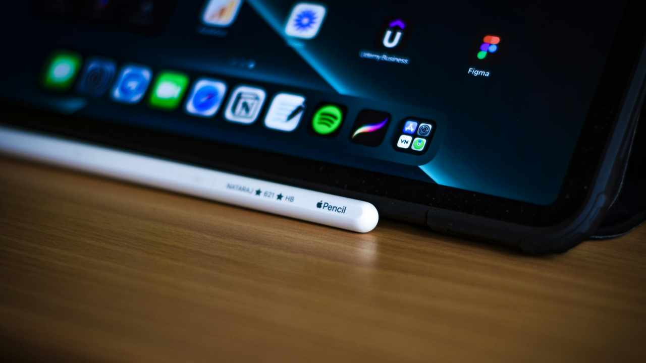 A MacBook Pro with Apple Pencil.